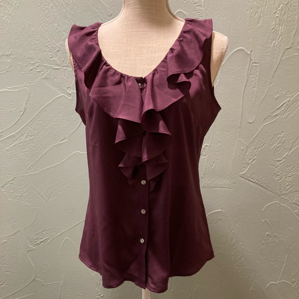Banana Republic 
M-Purple ruffle top with rhinestone buttons